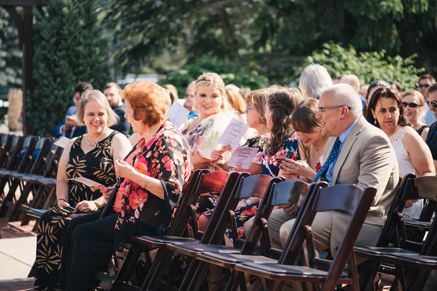 wedding guests waiting for ceremony to begin