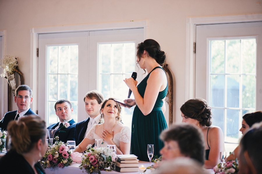 maid of honor delivering heartwarming speech to the bride