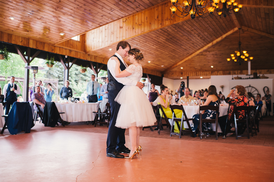 bride and groom dancing together at becker farms reception