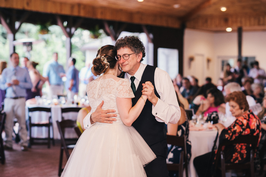 bride and father dancing together at reception