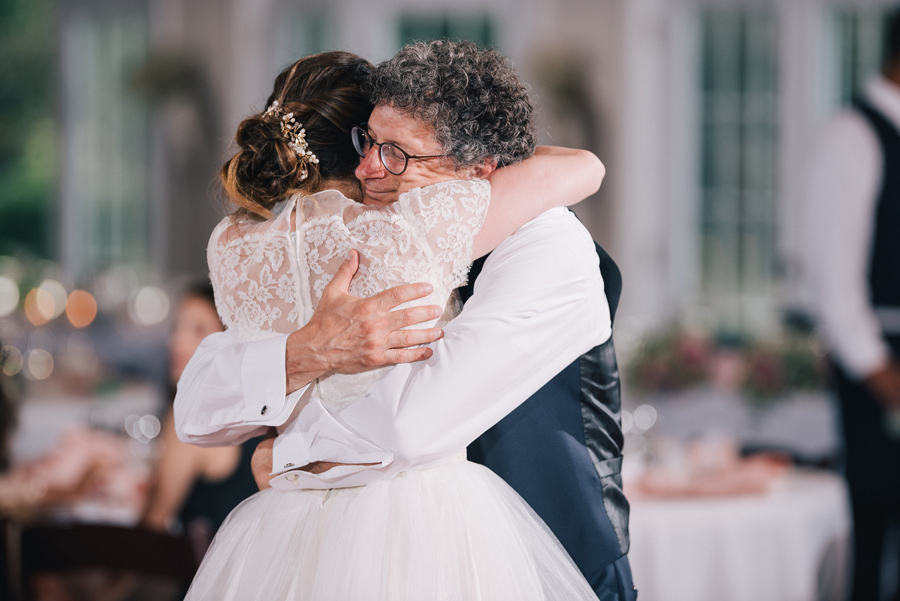 bride and her father hugging