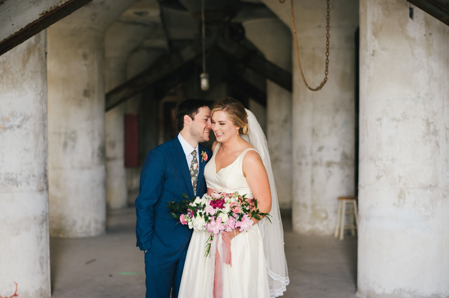 bride and groom inside the silos