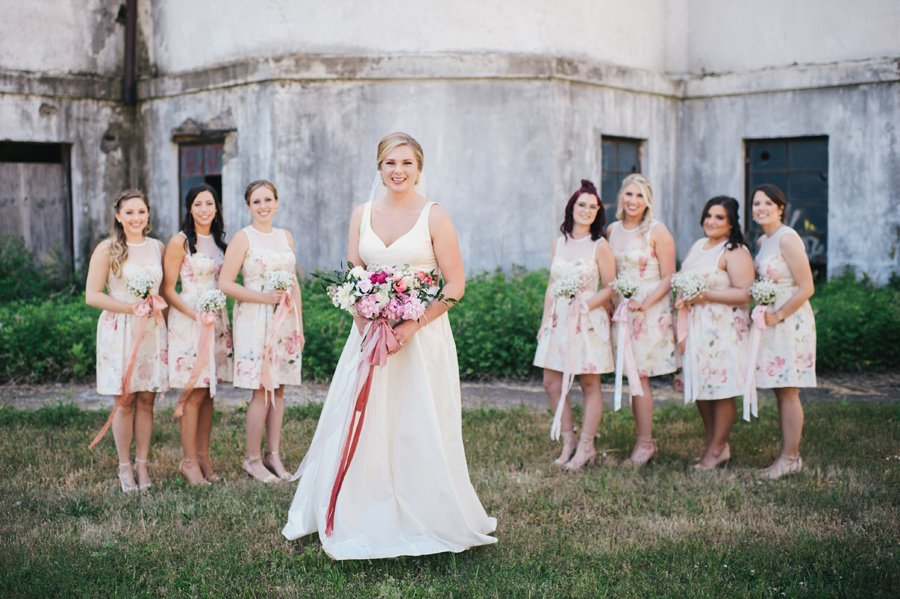 full length shot of bridal party outside of silo city