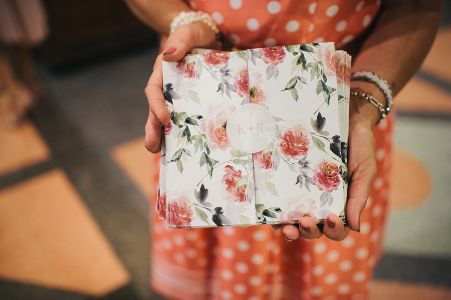 floral folded wedding programs with couples initials