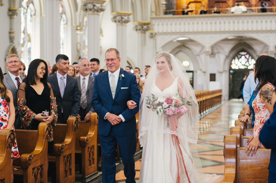 father escorting the bride down the aisle