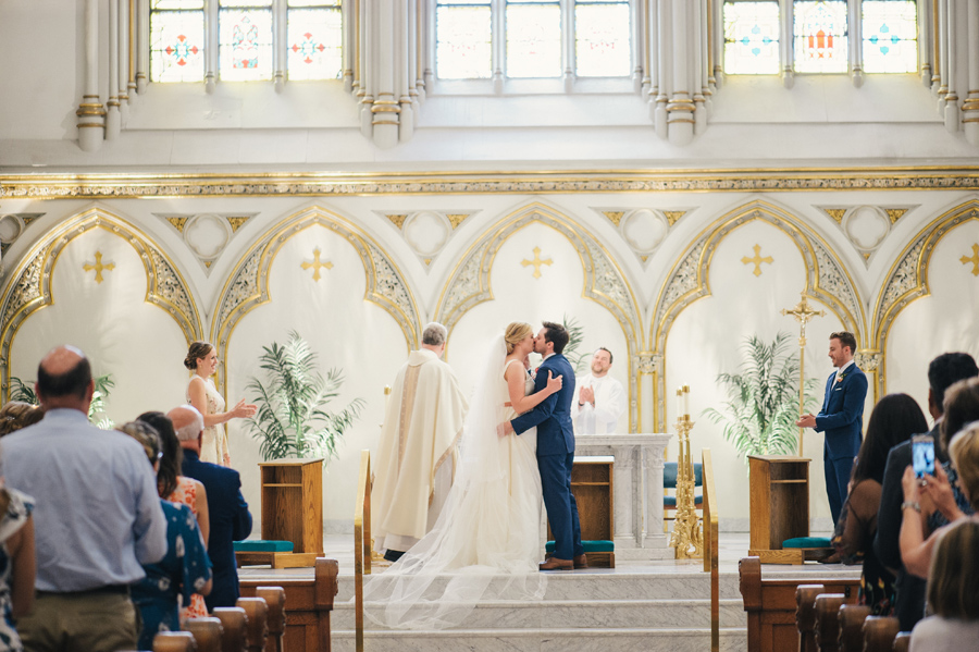 bride and groom i do kiss at st joseph cathedral