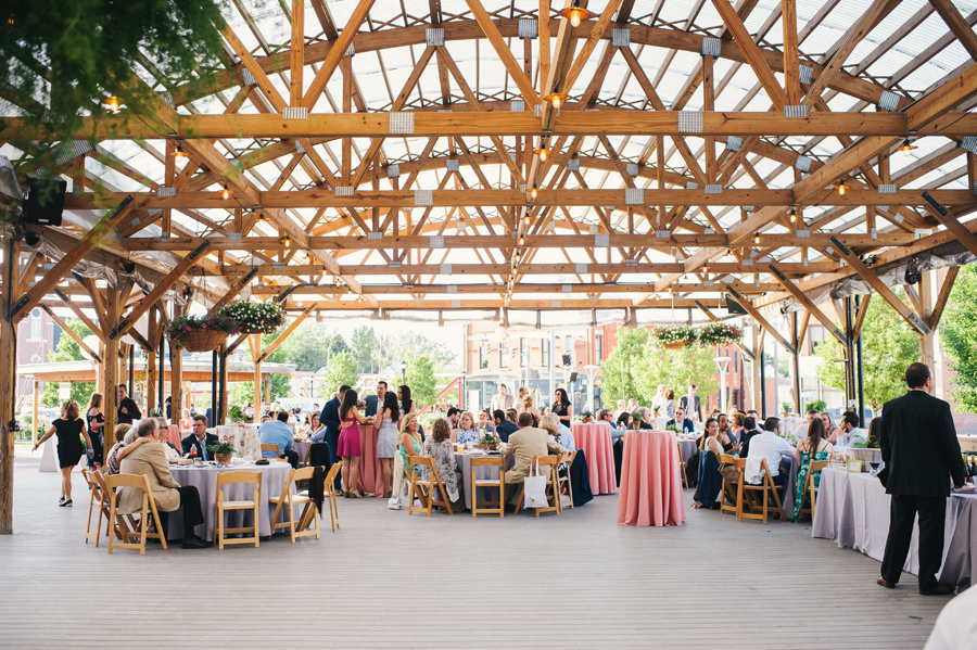 guests enjoying the reception under the larkinville pergola