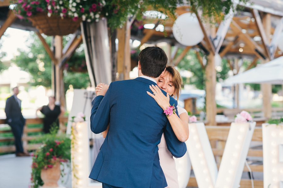 mother son dance surrounded by flowers from west wind floral