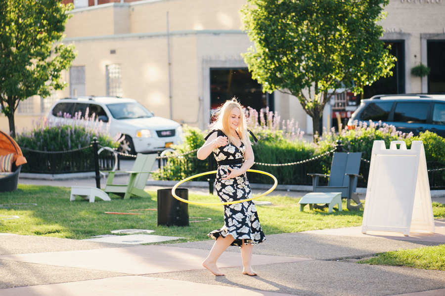 wedding guest using hoola hoop in larkin square