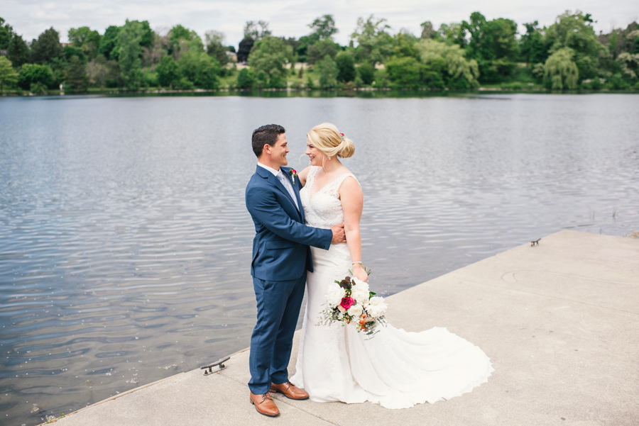 bride and groom together on the dock at hoyt lake