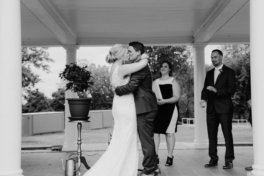 black and white of bride and groom i do kiss