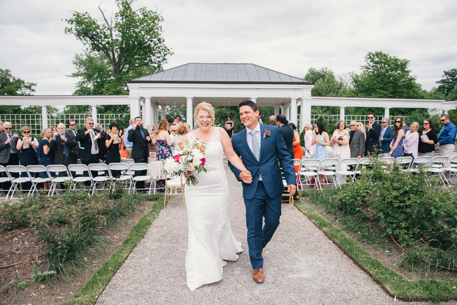 bride and groom laughing together after ceremony