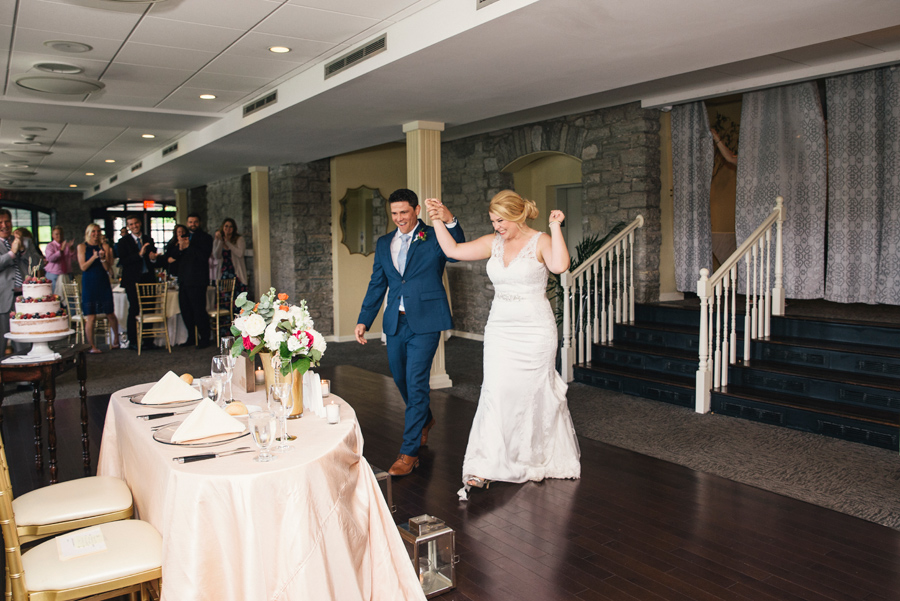 bride and groom grand reception entrance at marcy casino