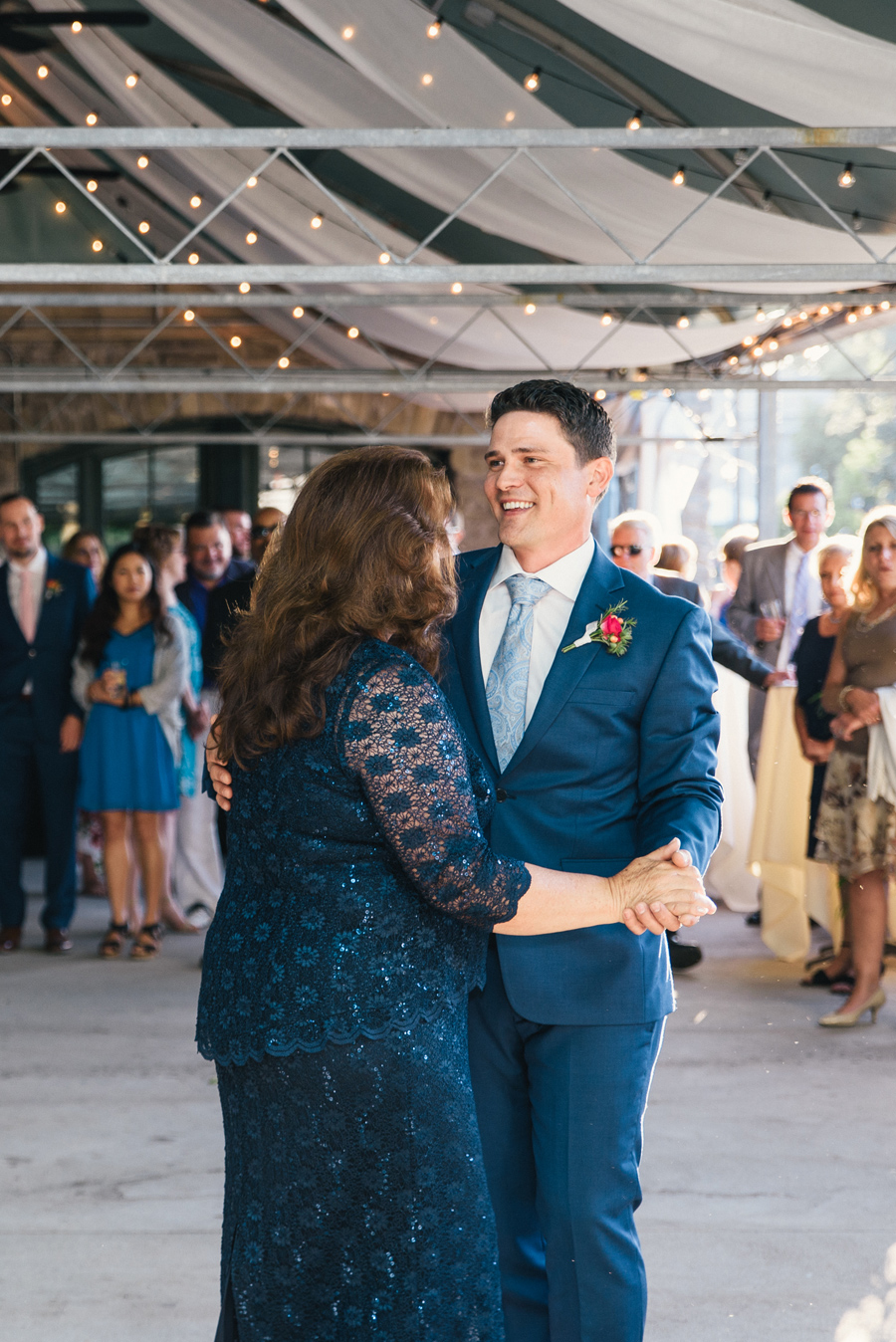 groom and his mother during mother son dance