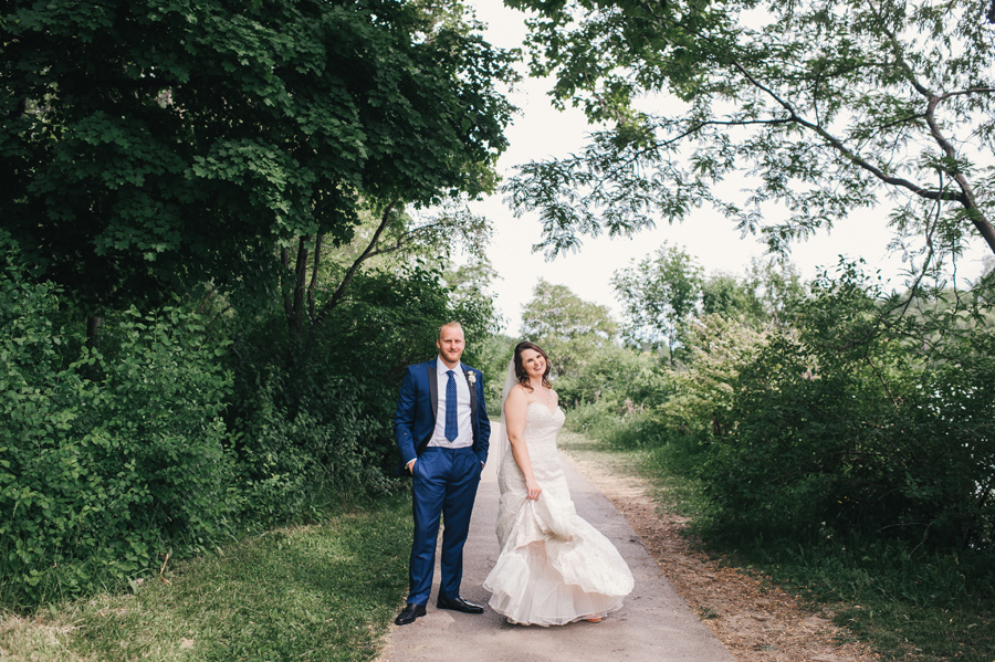 bride twirling her dress next to groom in delaware park