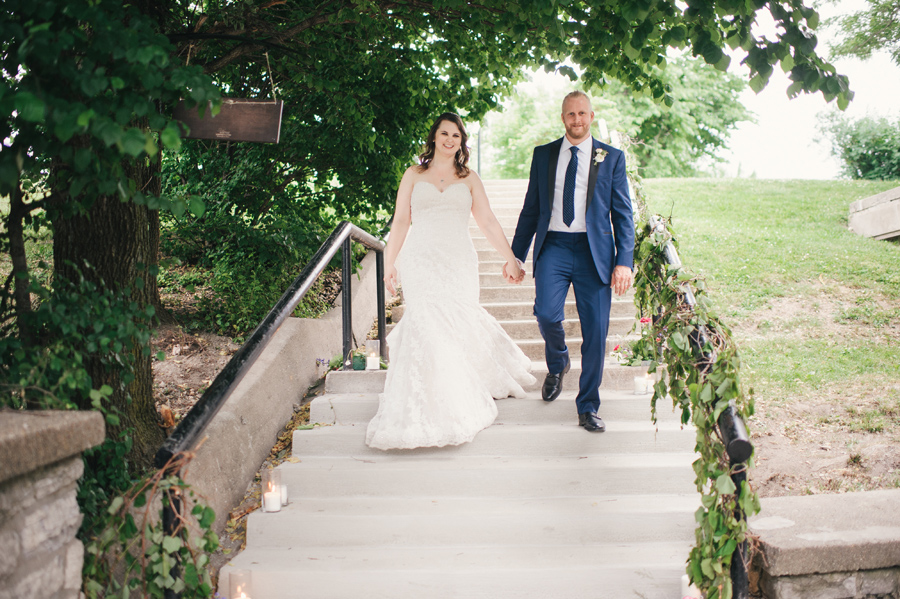 bride and heading heading down steps outside