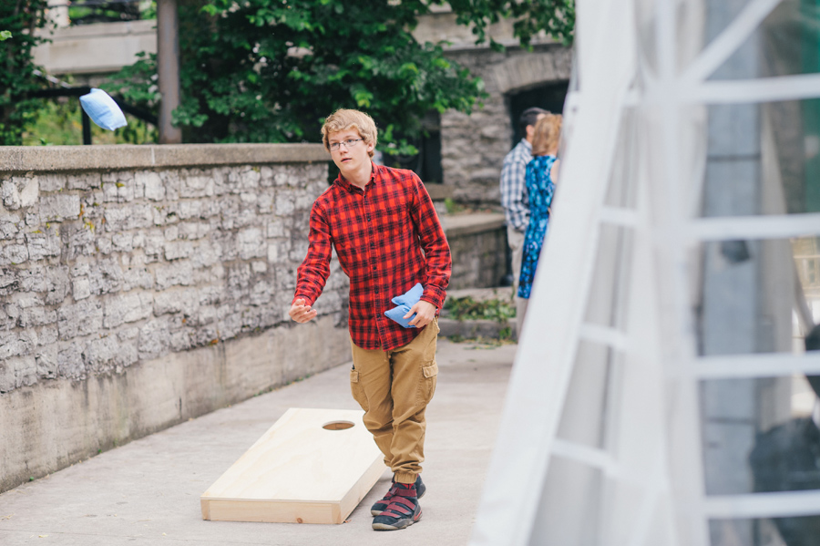 young wedding guest playing lawn games