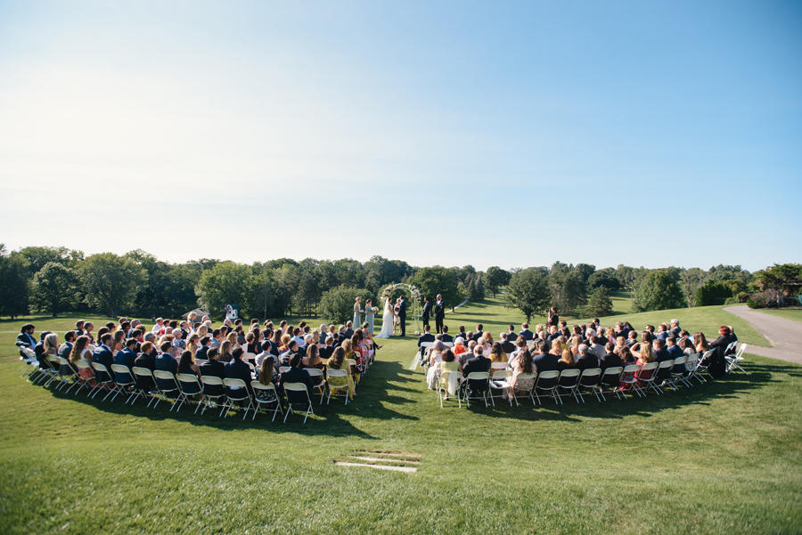 full shot of entire ceremony space on a golf course