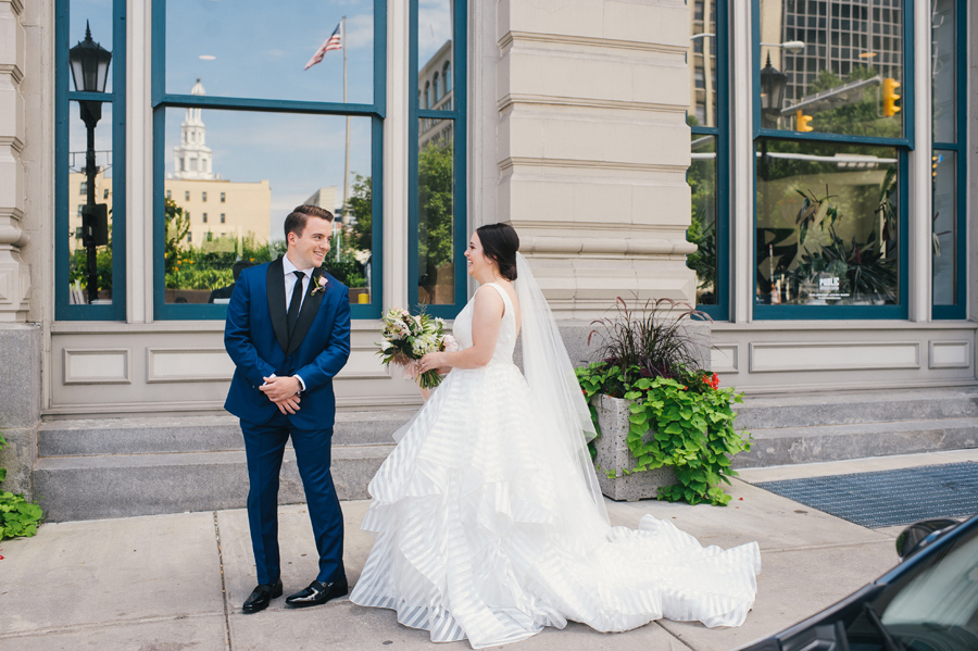 groom turning to see his bride for the first time on wedding day