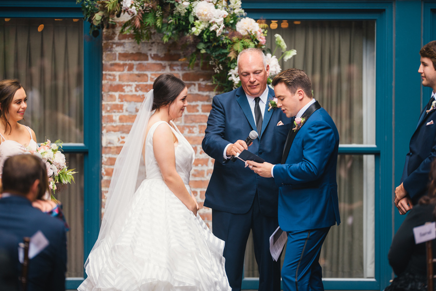 groom reading his vows