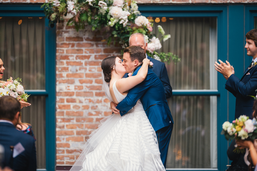 bride and groom's I Do kiss