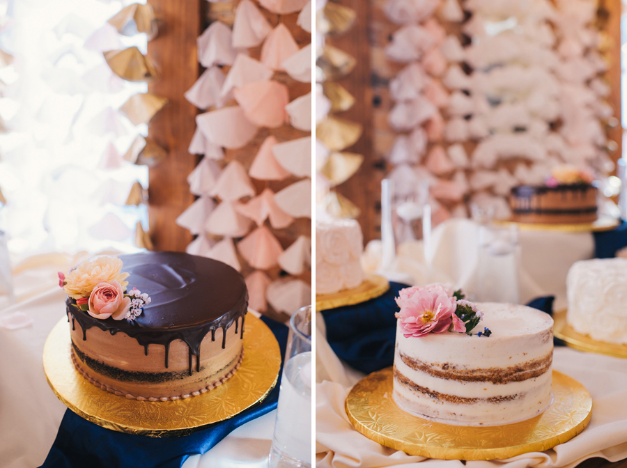 side by side shot of a chocolate cake with cascading chocolate ganache and a naked white cake adorned with pink flower