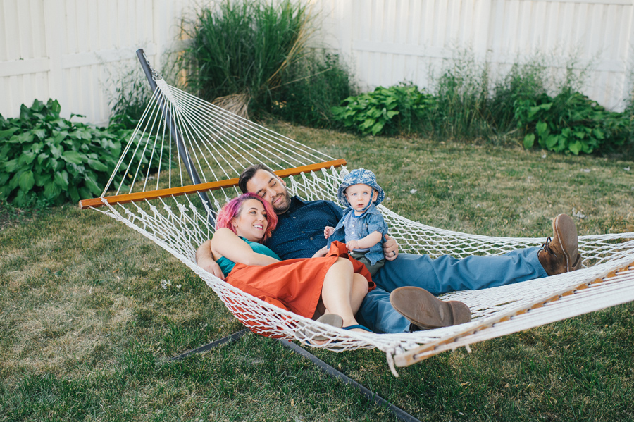 mom dad and baby in a hammock together