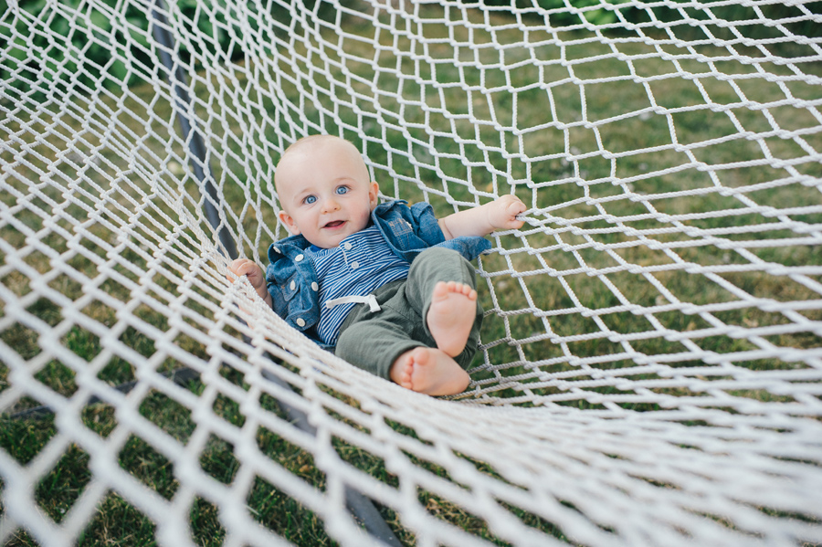 baby boy in a large hammock close up